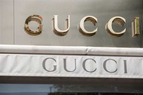 gucci brand ownership|who is Gucci owned by.